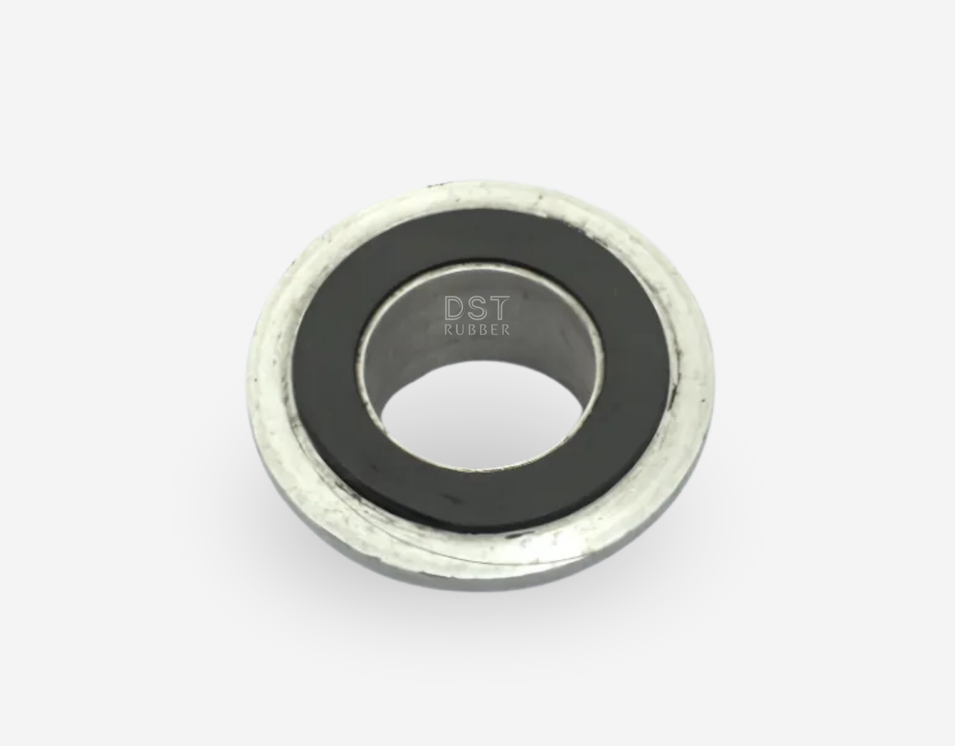 Rubber-metal bonded component for vibration damping and sealing applications – manufactured by DST Rubber India for automotive and industrial use